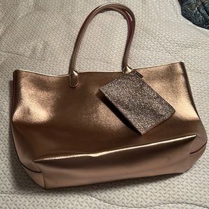 BATH AND BODY WORKS- Pink Metallic bag with pink glitter pouch-never been used